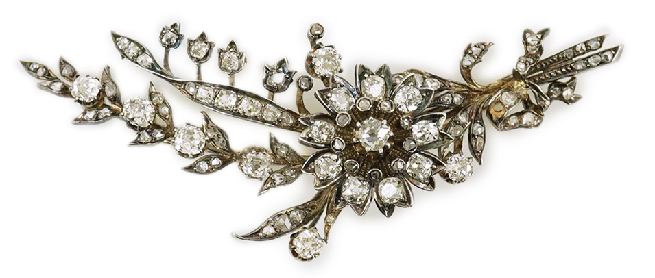 A Victorian gold, silver and diamond cluster foliate spray brooch